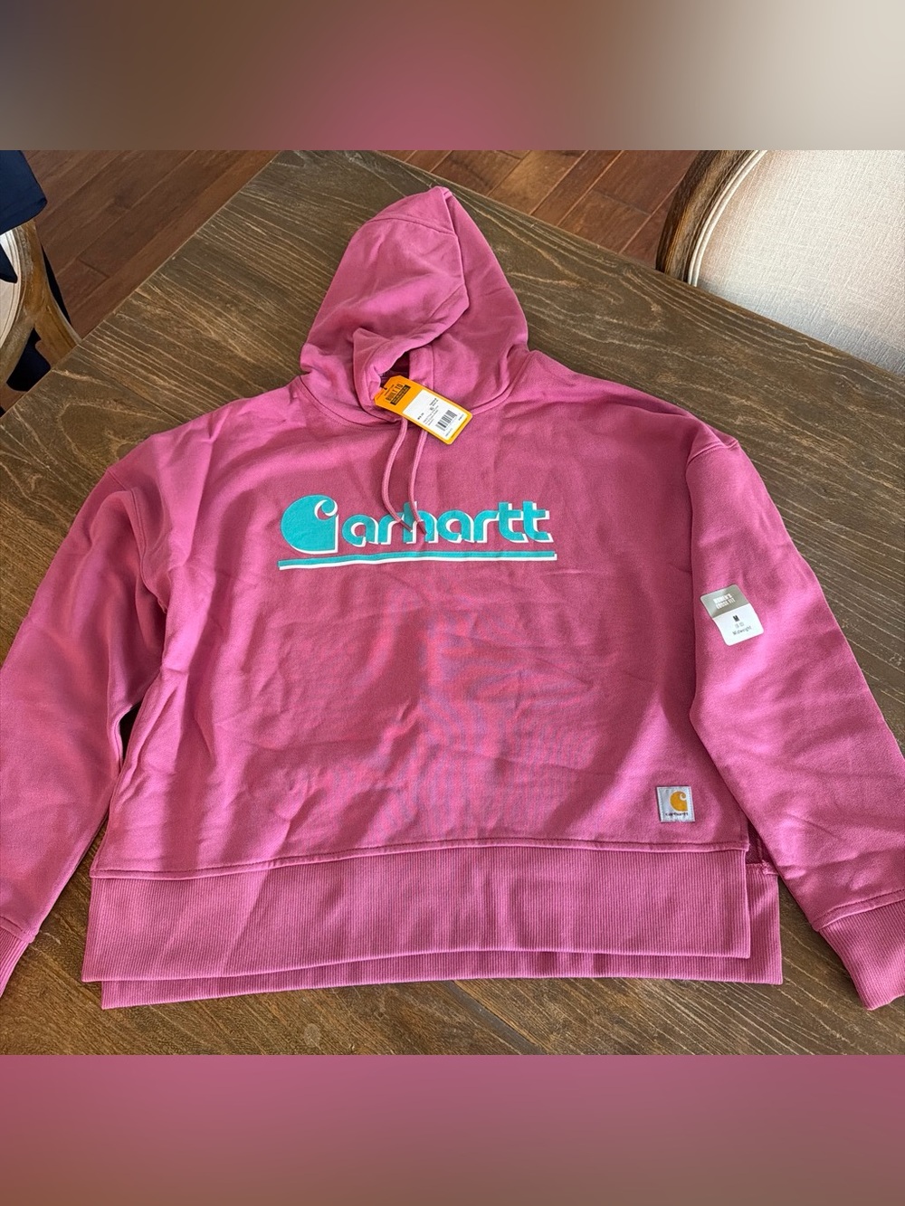 Carhartt Womenβs Pink Hoodie with Teal Logo